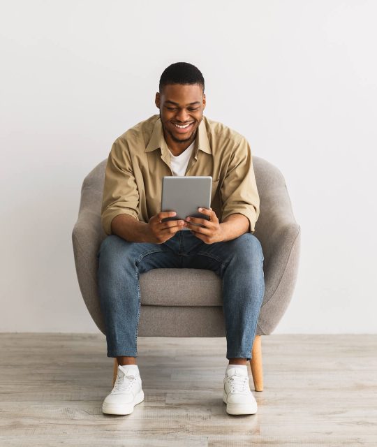 happy-african-man-using-digital-tablet-sitting-ove-2021-09-02-17-14-23-utc.jpg happy-african-man-using-digital-tablet-sitting-ove-2021-09-02-17-14-23-utc.jpg